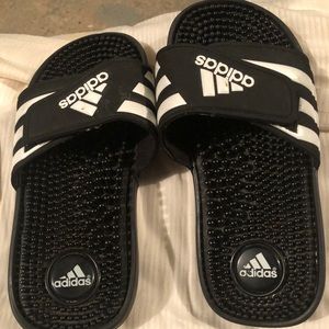 Child’s adidas slides